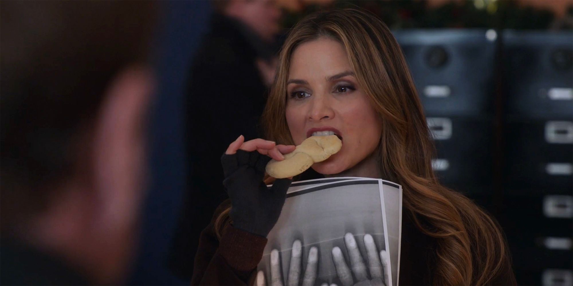 Jessica Knight eating a kringla in NCIS