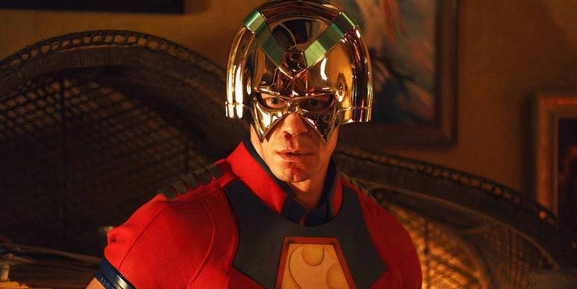 John Cena in his Peacemaker costume in Peacemaker season 1 looking shocked