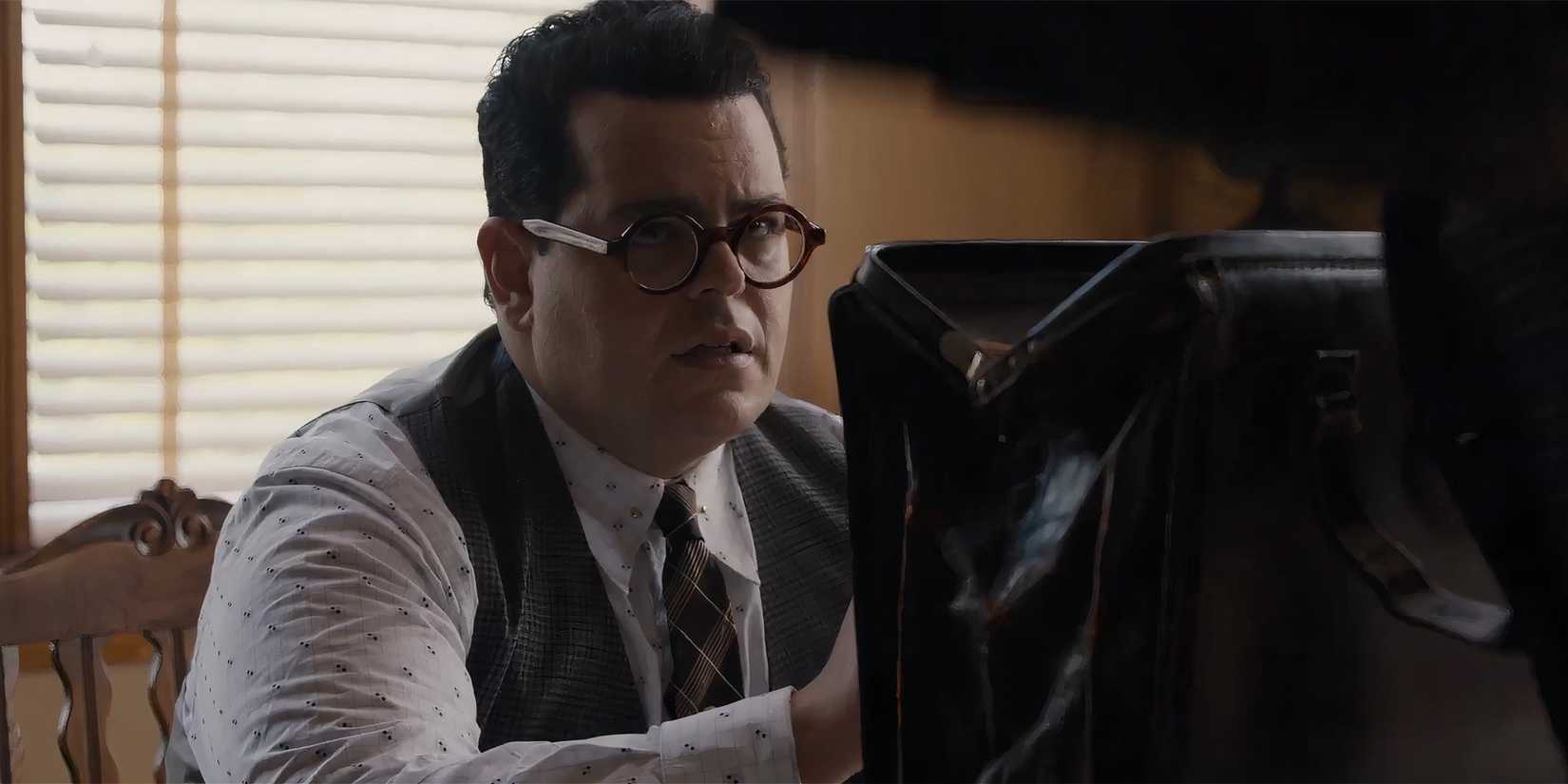 Josh Gad's Sam looking up and worried at Chadwick Boseman's Thurgood in Marshall
