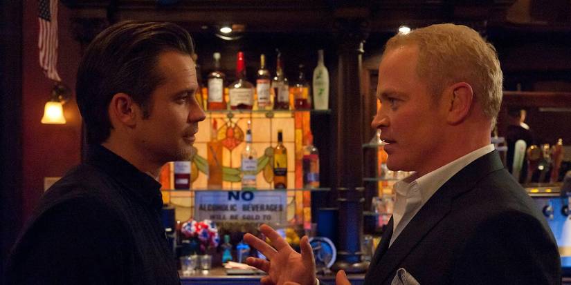 justified Neal mcdounough with character at bar