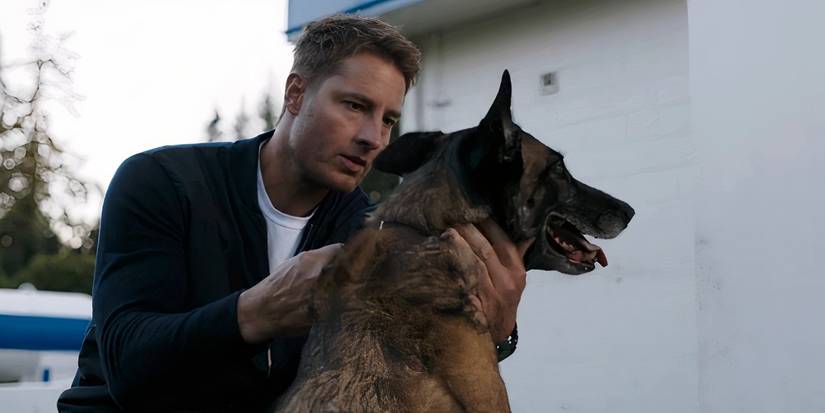 Justin Hartley as Colter with a dog in Tracker season 2 episode 7