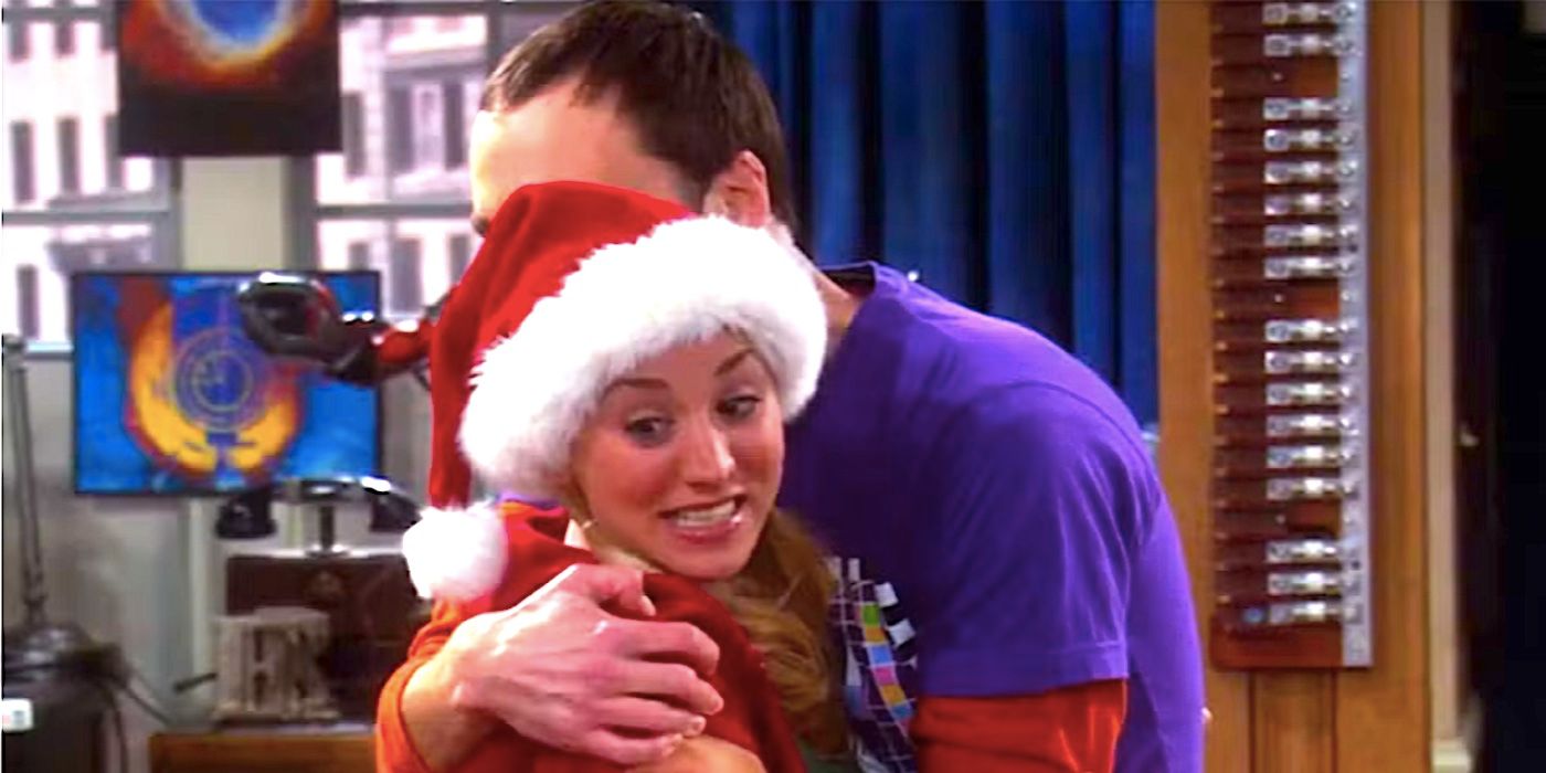 Kaley Cuoco&rsquo;s Penny grins in a Santa hat as Jim Parsons&rsquo;s Sheldon embraces her in The Big Bang Theory