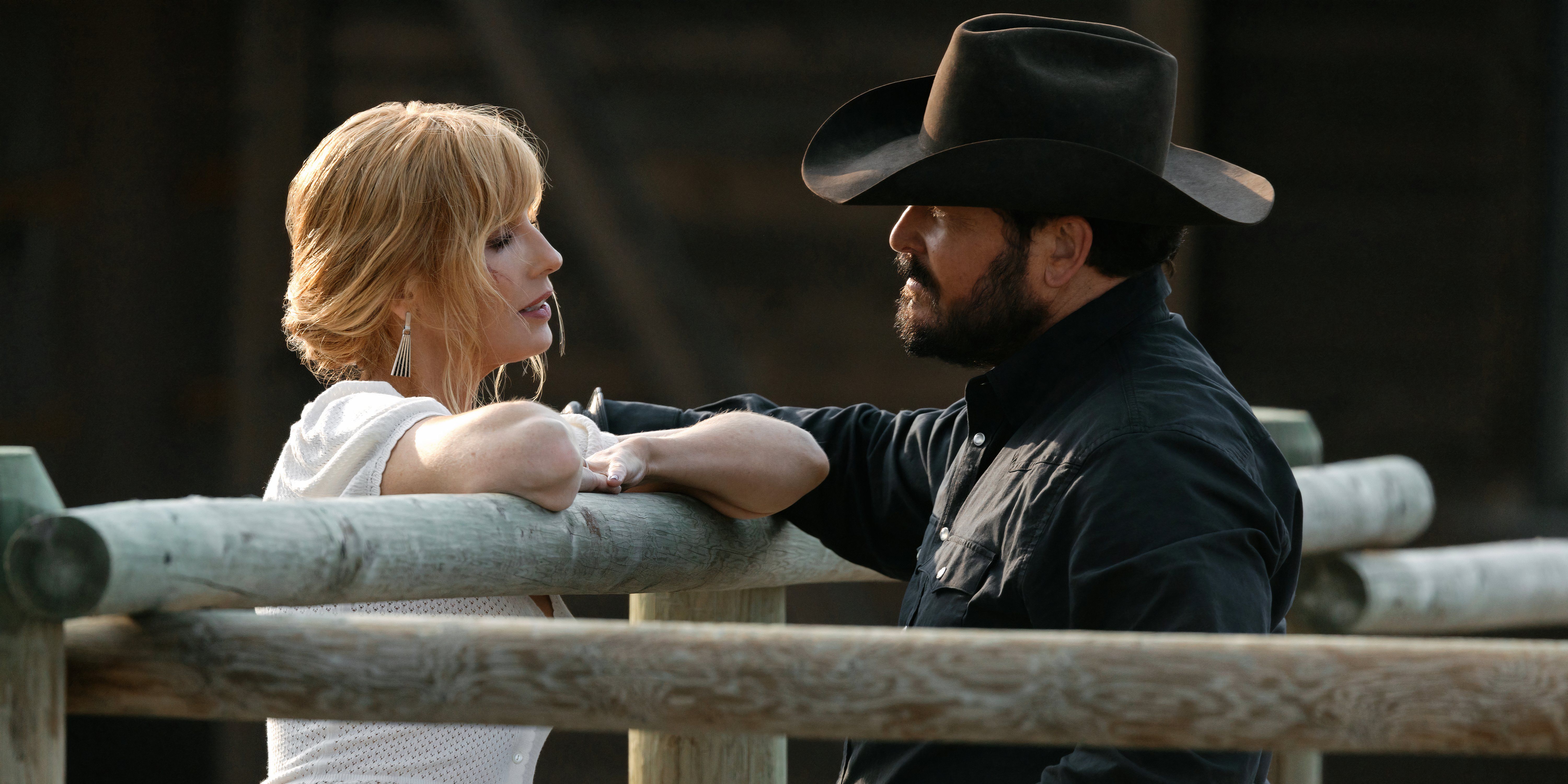 Kelly Reilly as Beth Dutton and Cole Hauser as Rip Wheeler in Yellowstone, looking into each others' eyes.