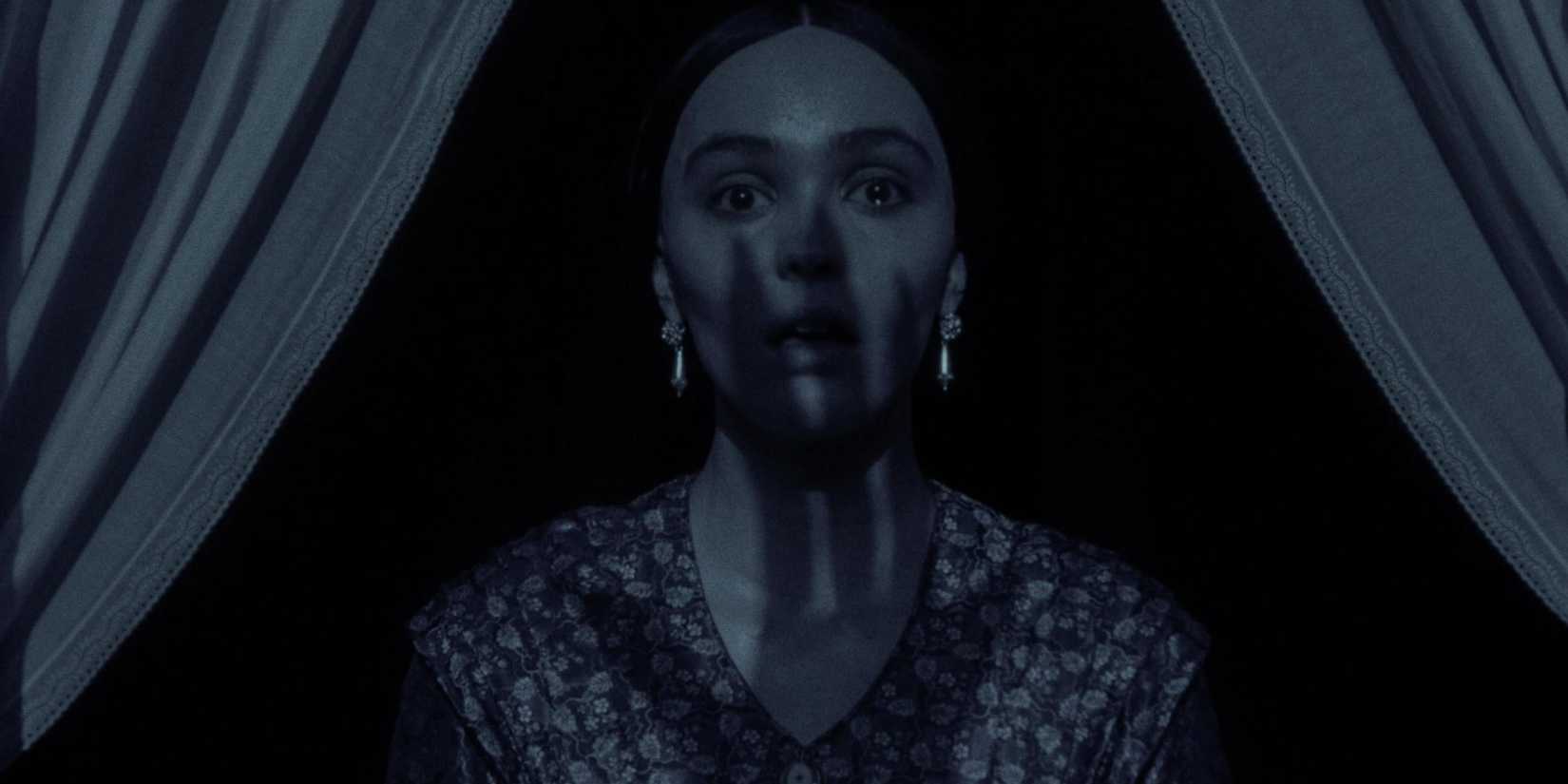 Lily-Rose Depp looking terrified in Nosferatu