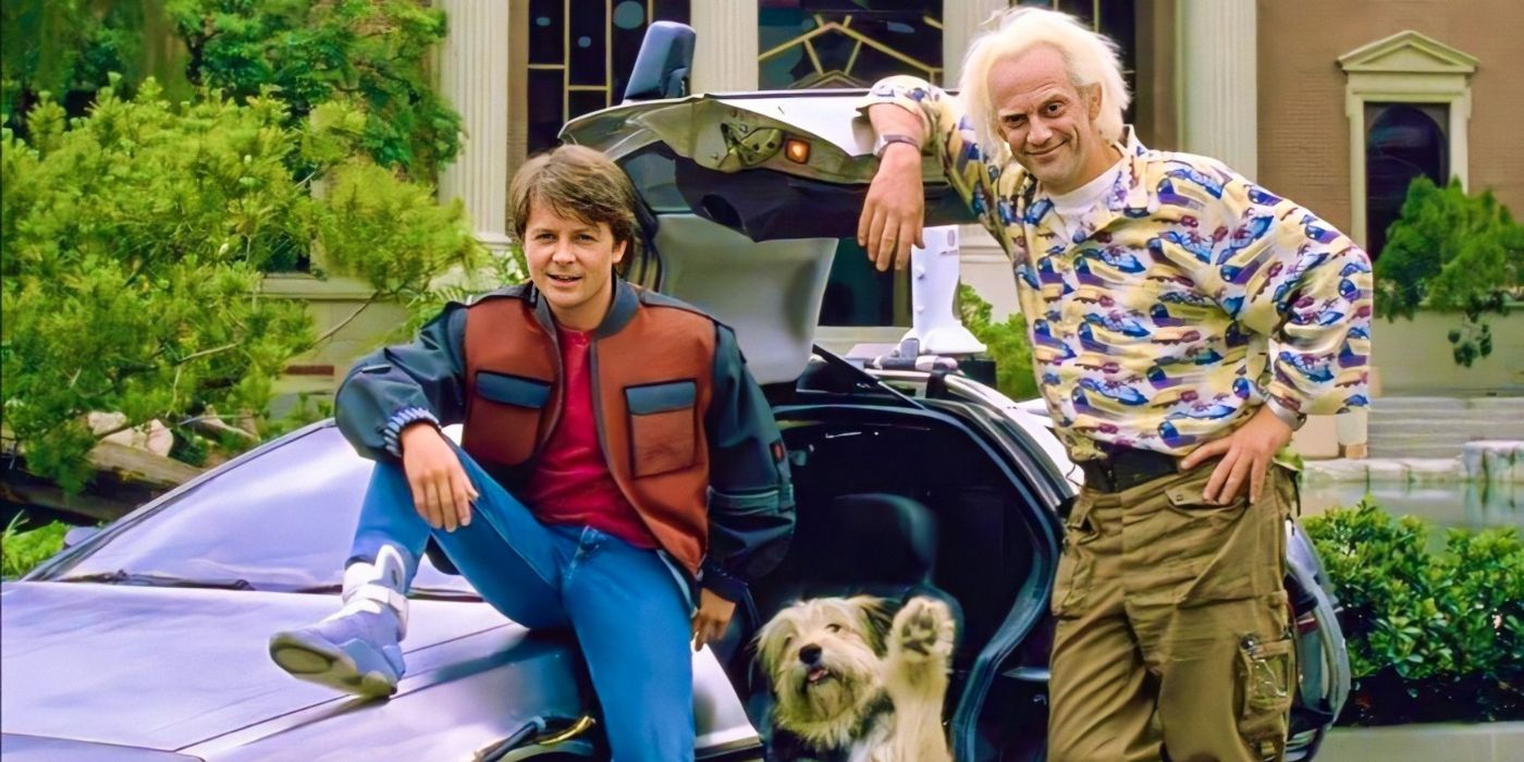 Marty McFly and Doc Brown standing by the DeLorean with Einstein in Back to the Future 2