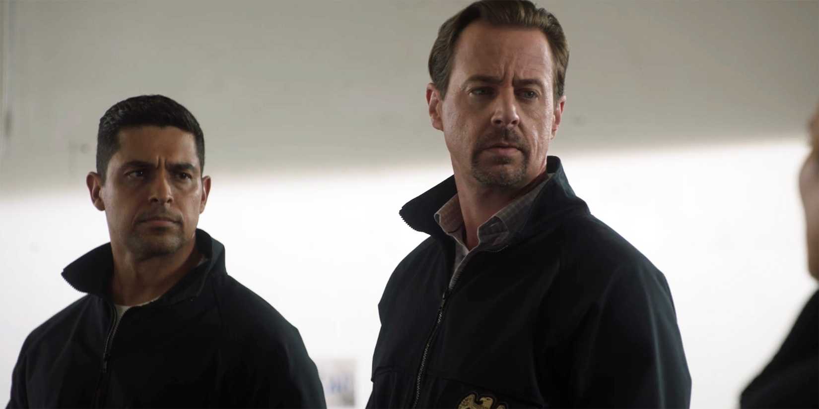 Nick and McGee look at Jimmy off camera in NCIS season 22