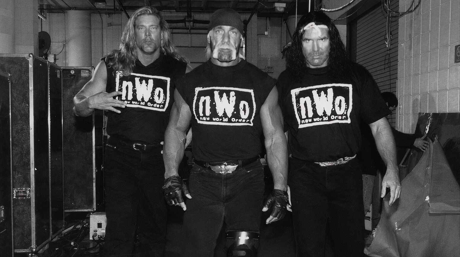 Kevin Nash, Hulk Hogan and Scott Hall enter a WWE Arena before their Way Out debut in 2002.