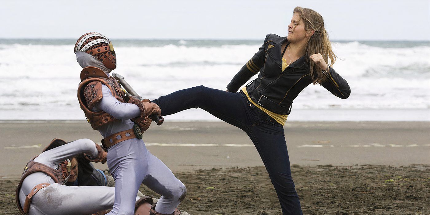 Power Rangers RPM - Rose McIver as Yellow Ranger kicking an enemy on the beach