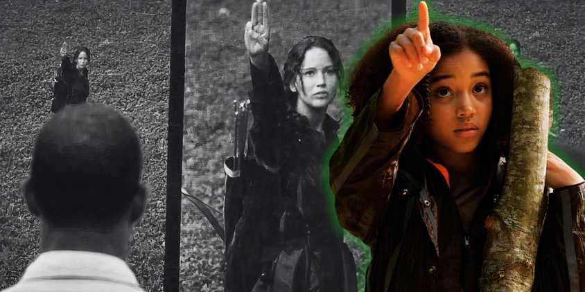 Rue climbing a tree over an image of Katniss saluting on the arena camera feed in The Hunger Games