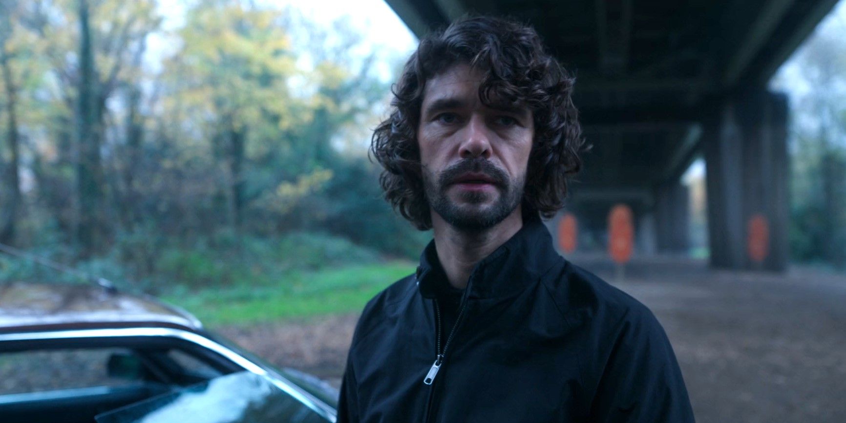 Sam Young (Ben Whishaw) under an overpass in Black Doves