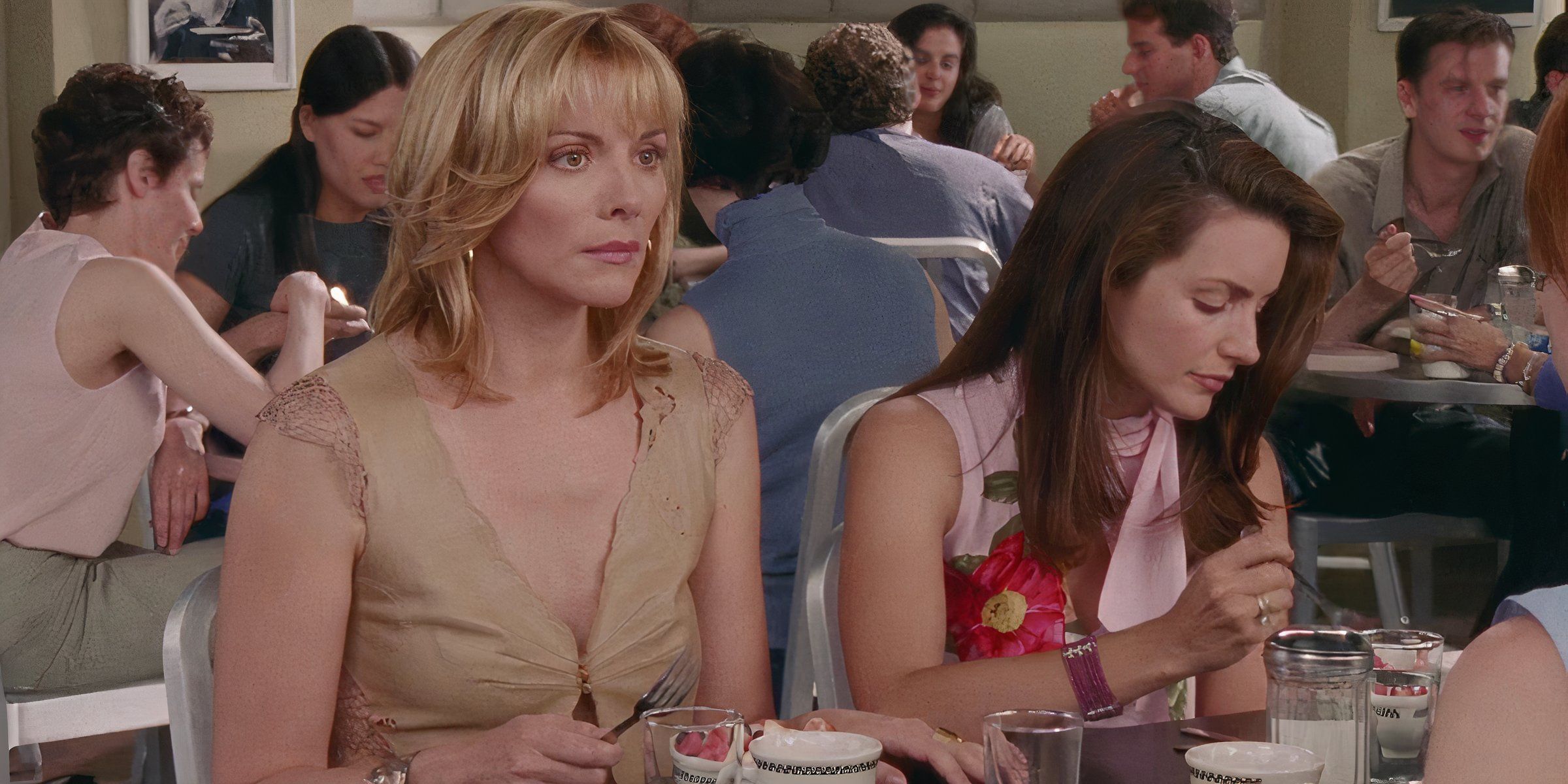 Samantha and Charlotte sitting side by side having breakfast in the Frenemies episode of Sex and the City