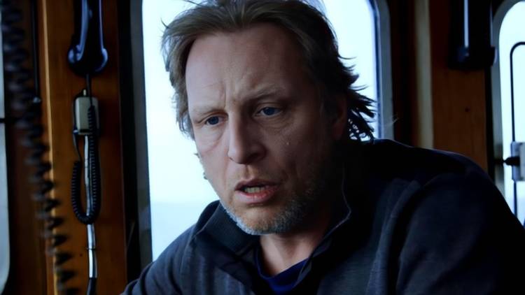 Sig Hansen looking shocked after hearing about Todd Kochutin in Deadliest Catch