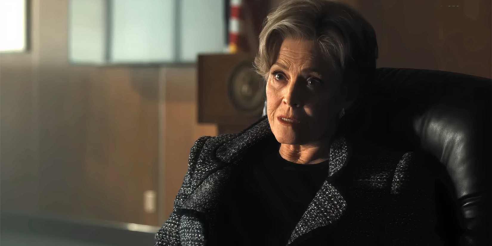 Sigourney Weaver looking serious while talking in The Gorge