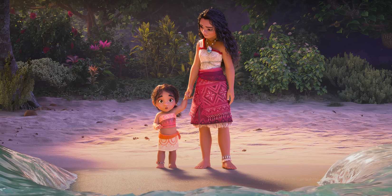 Moana and her little sister Simea hold hands on the shore in Moana 2