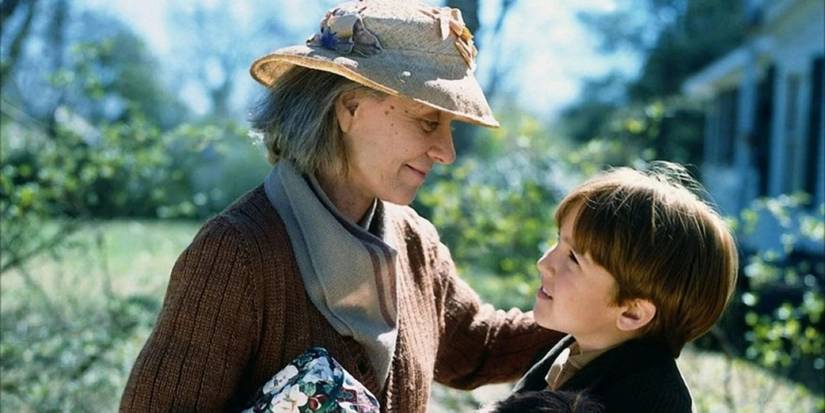 Sook (Patty Duke) smiling down at Buddy (Eric Lloyd) in A Christmas Memory.