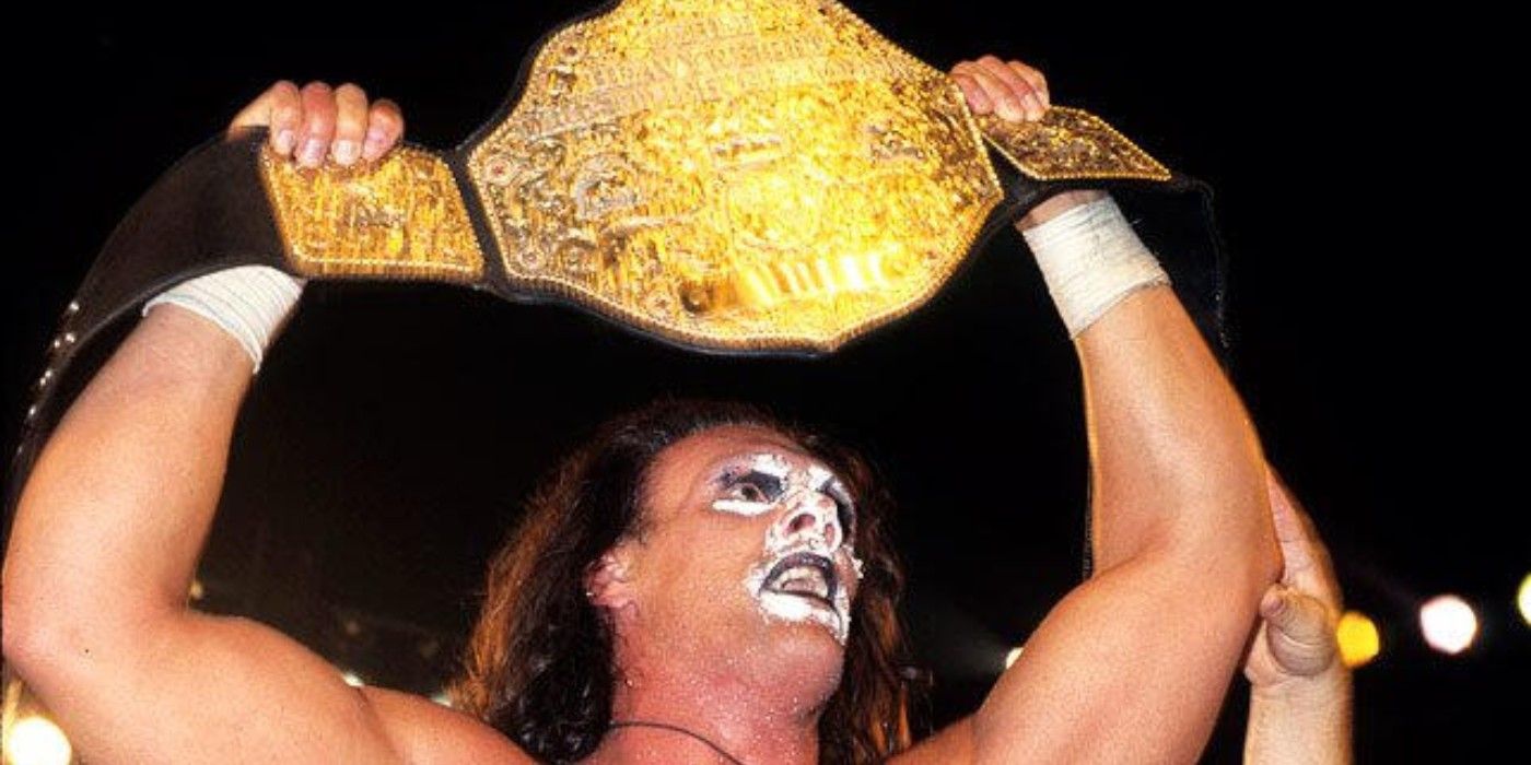 Sting raises the WCW World Hevyweight Championship above his head