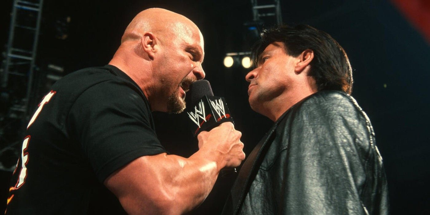 Stone Cold Steve Austin yells at Eric Bischoff on the microphone on WWE Monday Night Raw
