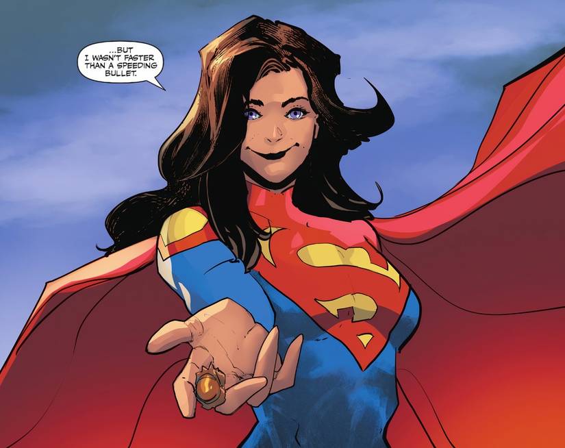 Comic book panel: Superwoman reveals she isn't faster than a speeding bullet as she holds a bullet that hit her