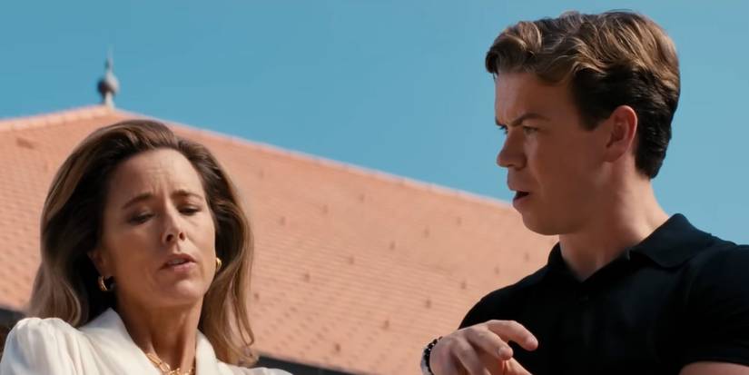 Tea Leoni and Will Poulter discussing something in Death of a Unicorn.
