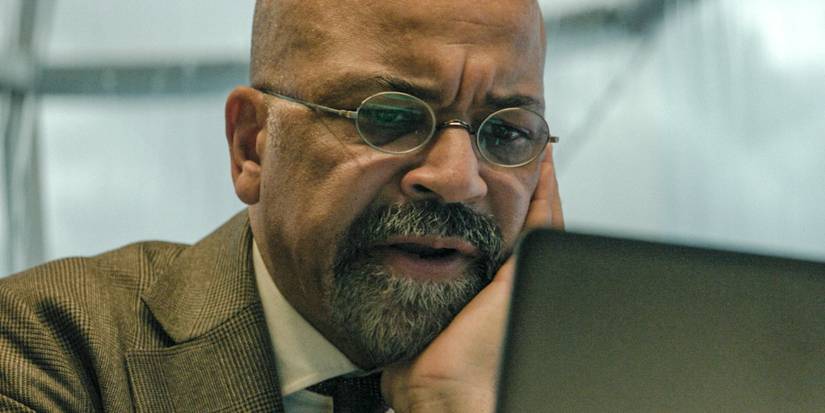 Jeffrey Wright looks at his laptop in The Agency season 1
