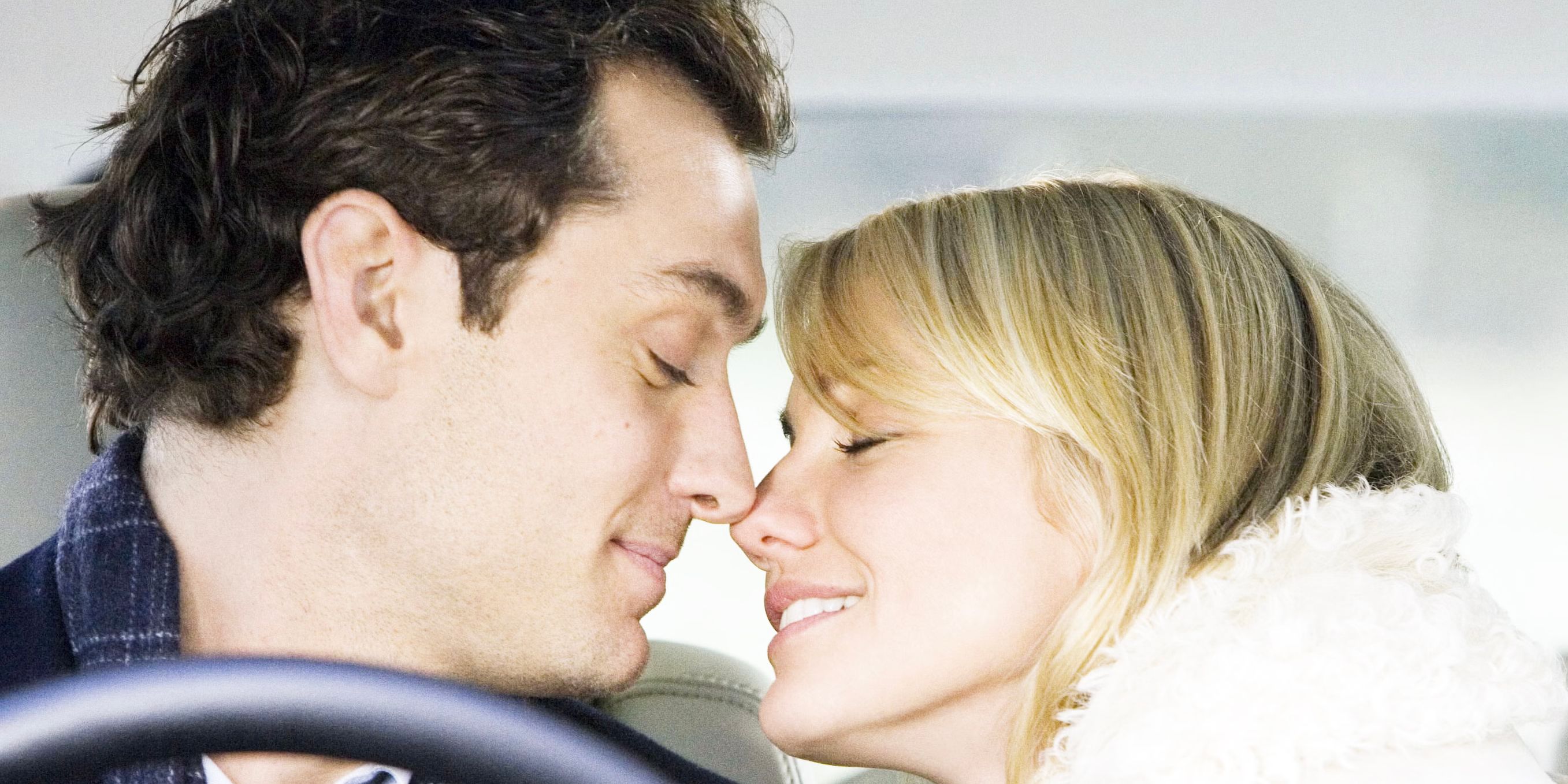 The Holiday movie Graham and Amanda about to kiss in the car