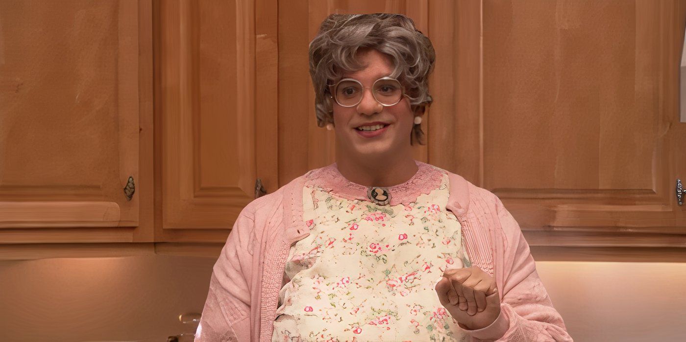 Tobias dressed as Mrs. Featherbottom and standing in the Bluths' kitchen in Arrested Development.