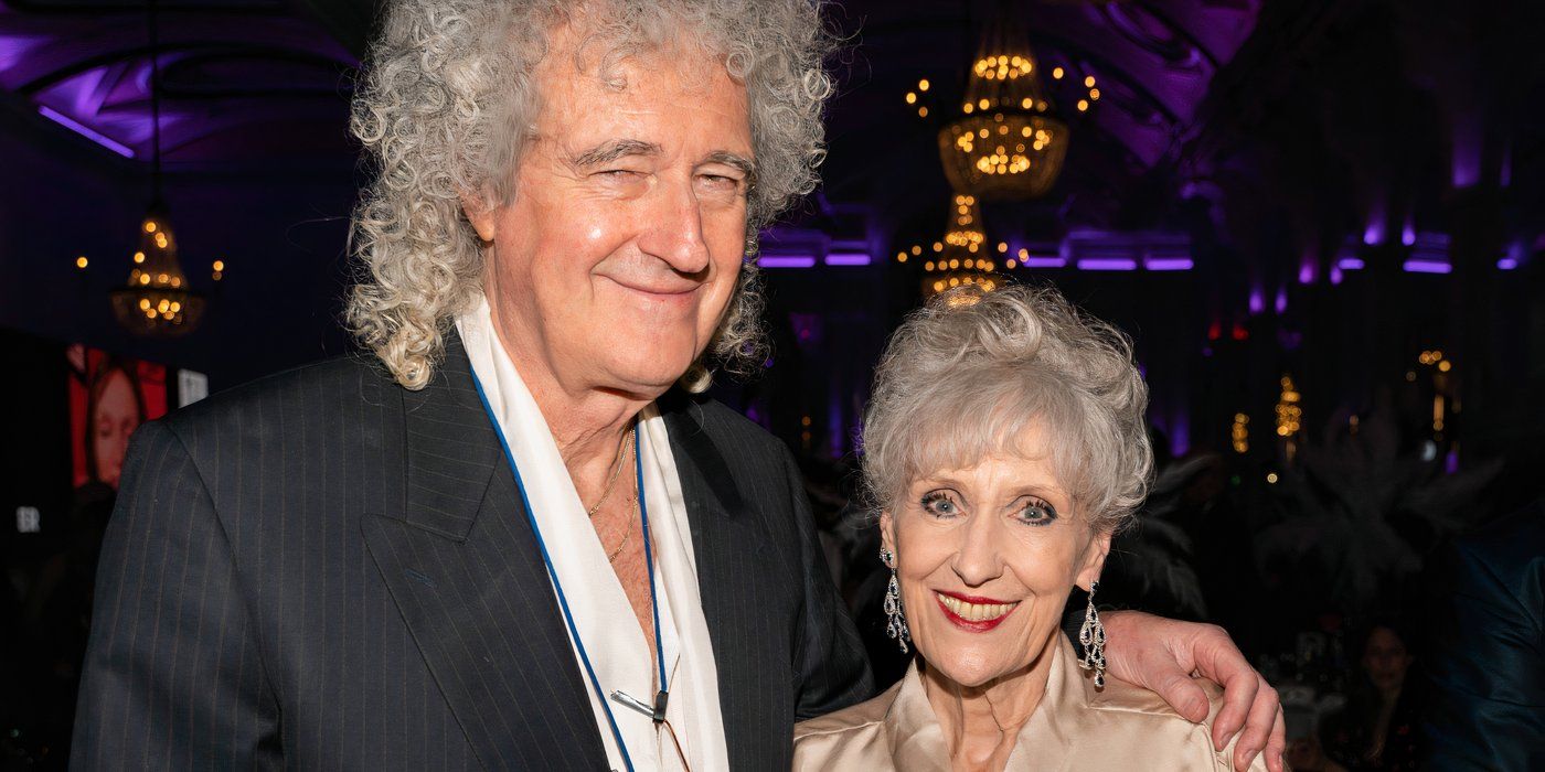 A atriz Anita Dobson e Brian May do Queen em um evento juntos.