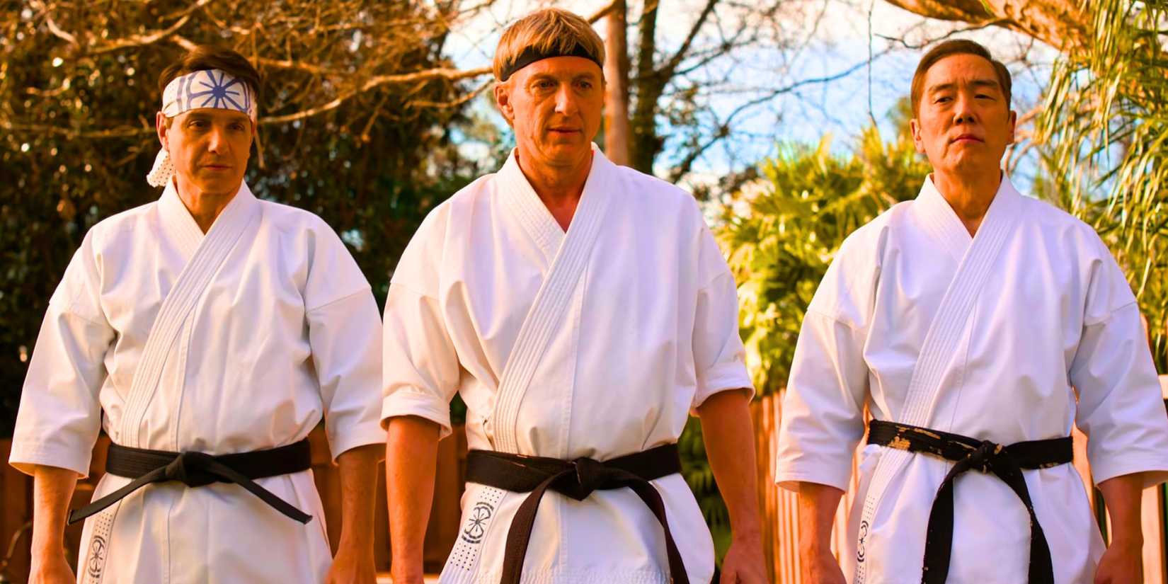Cobra Kai image of Daniel, Johnny, and Chozen all wearing Miyagi-do uniforms