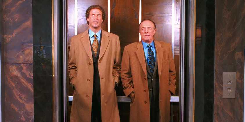 Will Ferrel and James Caan standing in an elevator in Elf