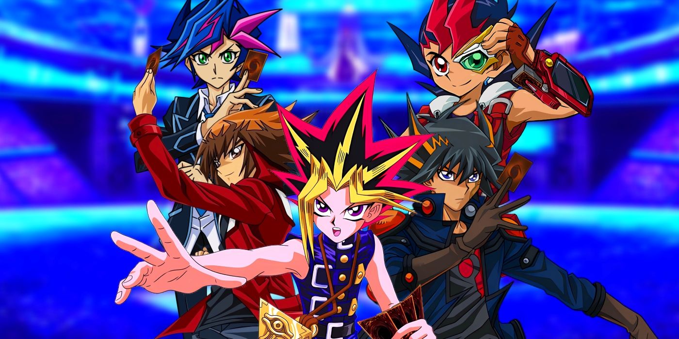 Yugi, Jaden, Yusei, Yuma, and Yusaku standing togheter. Behind them, Kaiba's arena can be seen. 