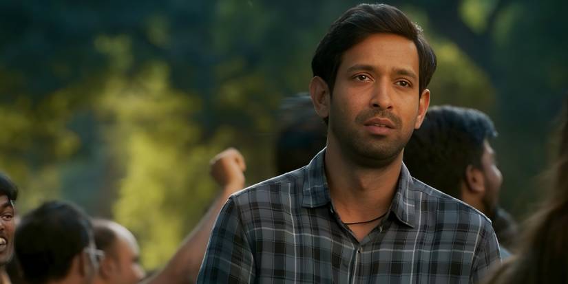 Vikrant Massey looking earnest as Sharma standing by a chanting crowd in 12th Fail