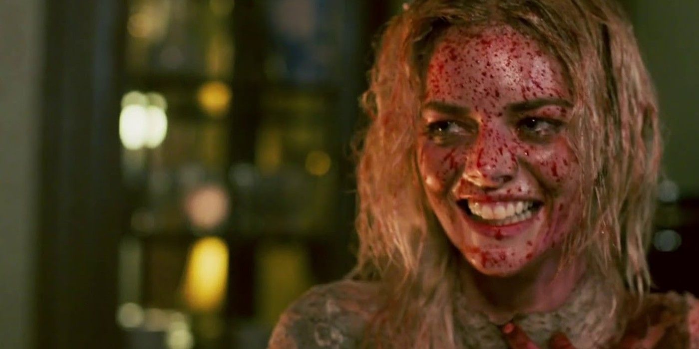 Samara Weaving as Grace laughing covered in blood in Ready or Not