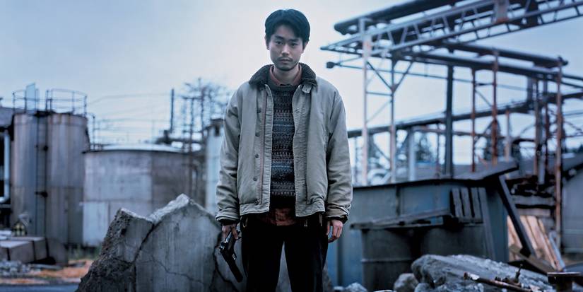 A character standing at an abandoned building in Cloud 2024