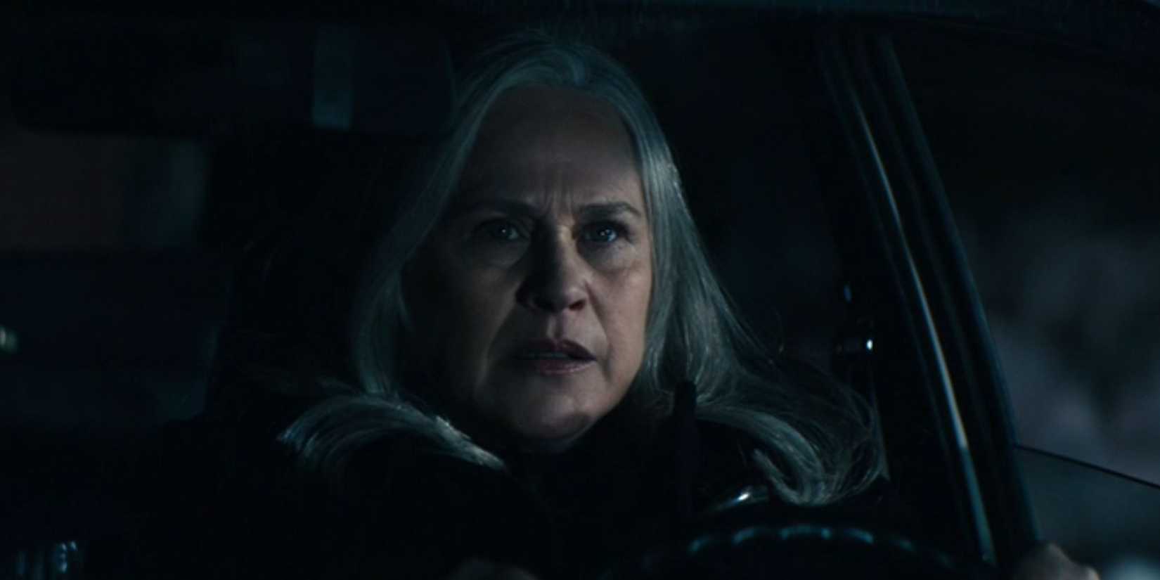 Patricia Arquette behind the wheel of a car as Ms. Cobel in Severance