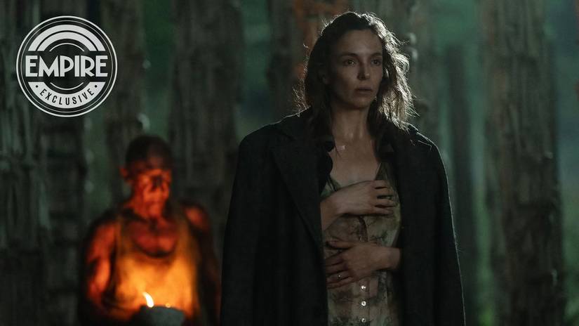 Jodie Comer stands in the Bone Temple in front of Ralph Fiennes in an exclusive Empire image