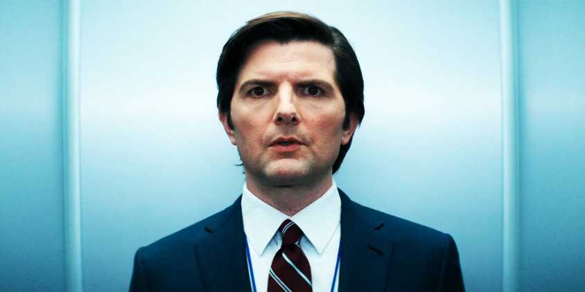 Adam Scott as Mark in Severance season 1, episode 7, looking at someone off-camera