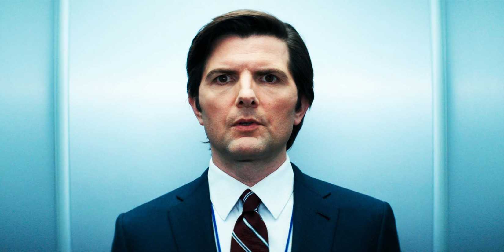Adam Scott as Mark in Severance season 1, episode 7, looking at someone off-camera