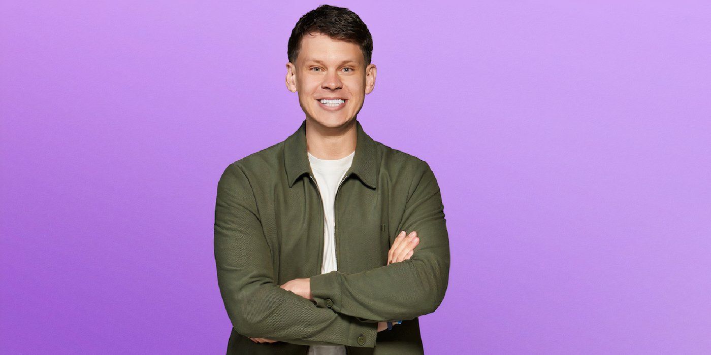 Love is Blind Season 8 Adam Bevis standing with arms crossed on a purple background