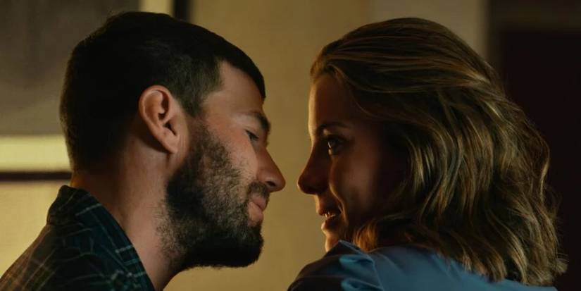 Aidan (Austin Stowell) about to kiss Lina (Betty Gilpin) in Three Women.