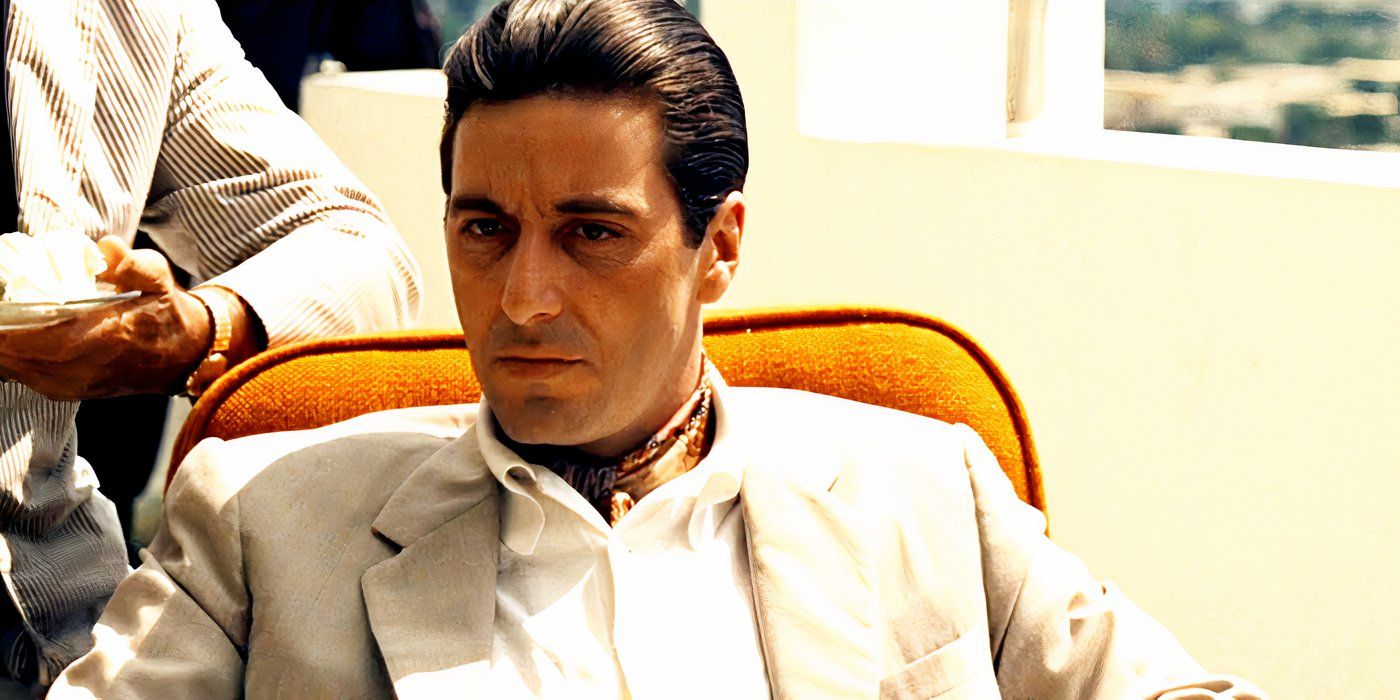 Al Pacino as Michael Corleone sitting down outside in The Godfather 2.