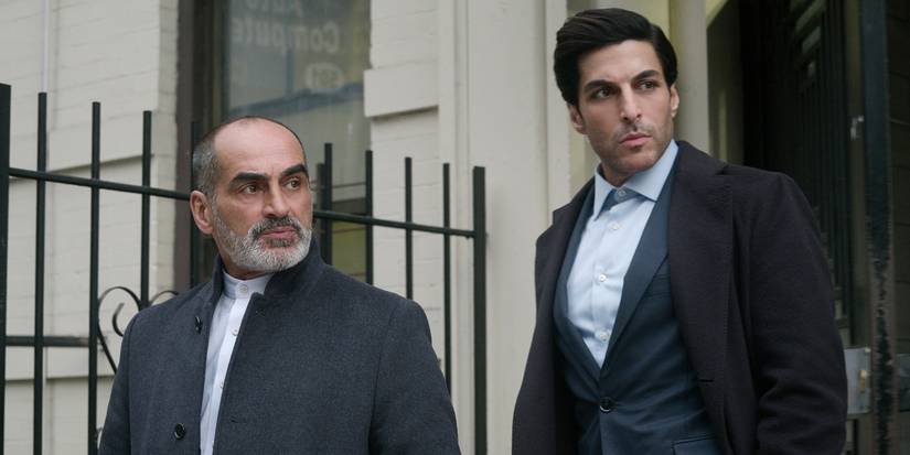 Ambassador Abbas and Javad in The Night Agent walking down steps