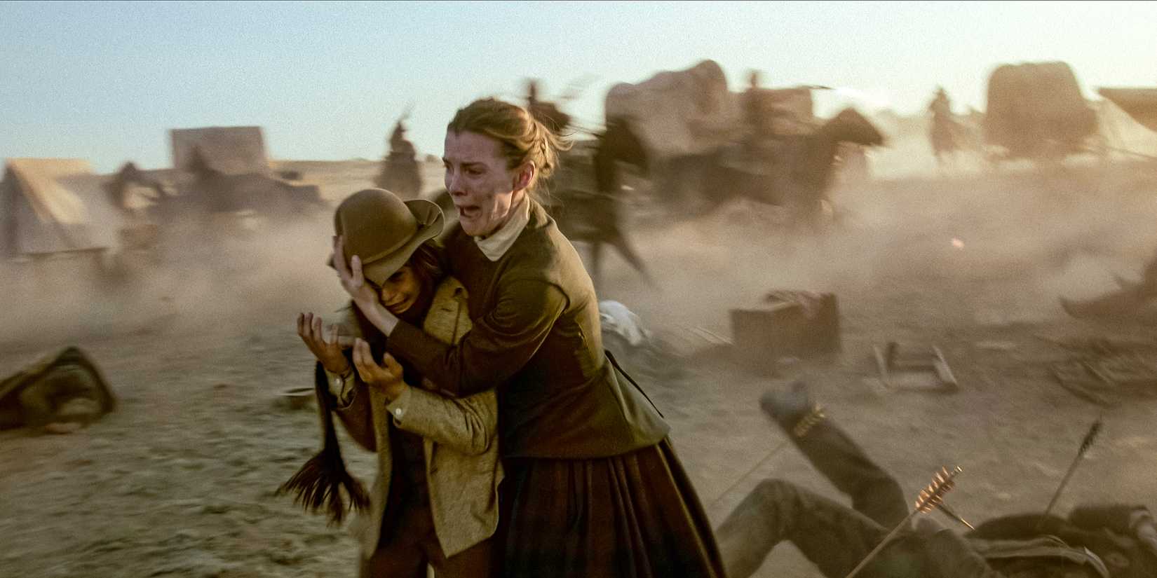 A woman protects her son from attack in American Primeval