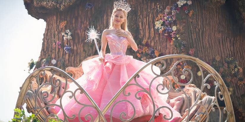 Ariana Grande wearing the pink bubble dress as Glinda in Wicked