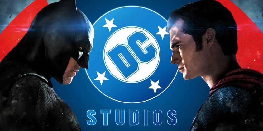 The poster for Batman v Superman (2016) either side of the DC Studios logo
