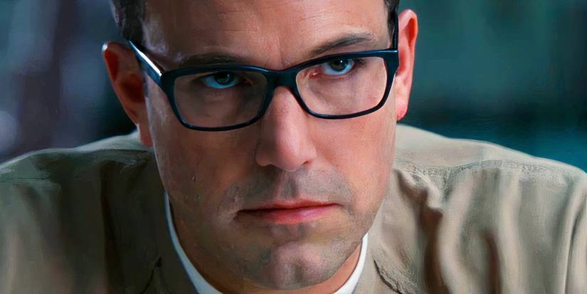 Ben Affleck as Christian Wolff glaring while wearing glasses in The Accountant 2