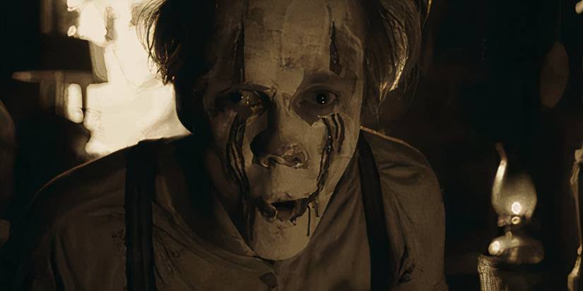Bill Skarsgard As Pennywise with clown makeup on In IT Chapter 2