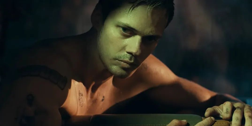 Bill_Skarsgards_Eddie_looking_tired_with_his_shirt_off_in_Locked