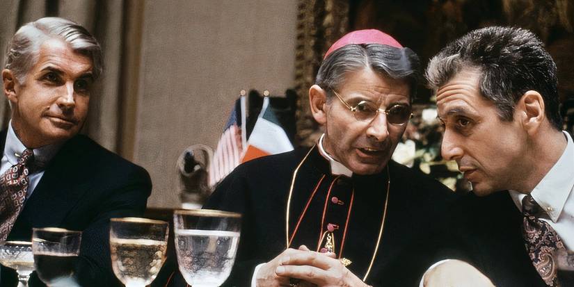 BJ Harrison looking at Michael Corleone talking to a Vatican member in The Godfather 3.