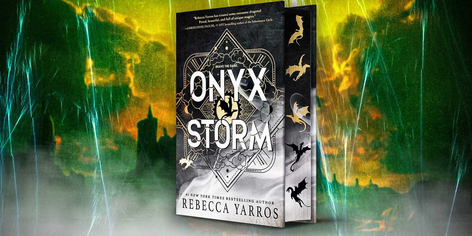 Onyx Storm by Rebecca Yarros turned at an angle and a city being rained on with lightning