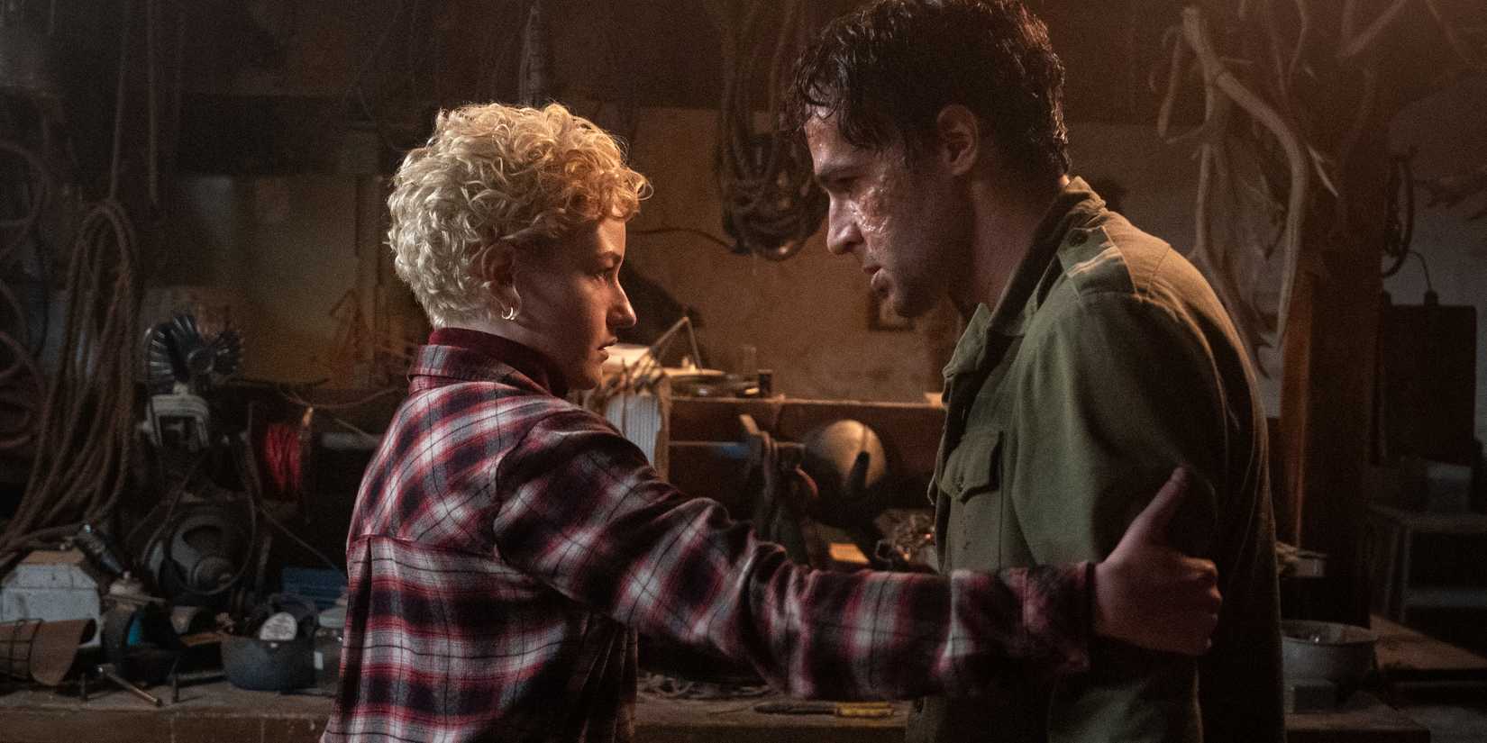 Charlotte cautiously grabbing early-transformation Blakes arm in Wolf Man